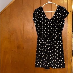 Black dress with white little flowers on it